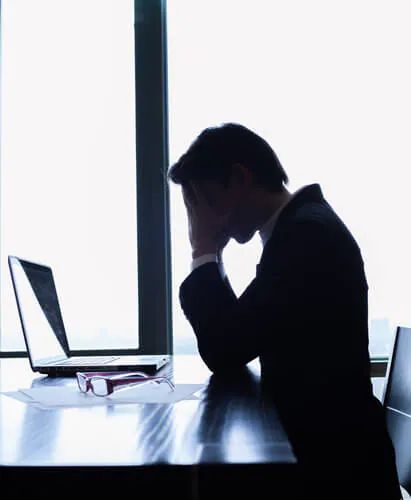 image of a stressed out office worker